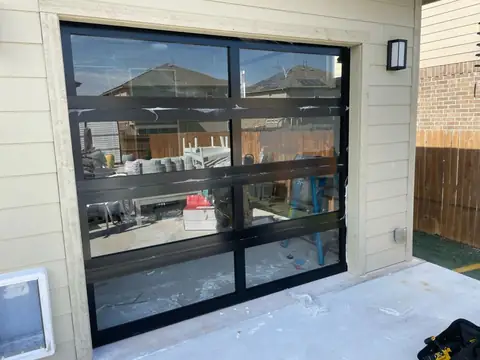 Full-view glass and aluminum garage door